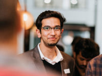Man smiling.