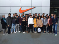 group photo in fornt of nike headquarters in germany