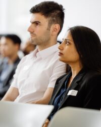 students listening to the course in a class room
