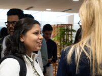 Student talking to the Career Service Manager at a get together for the students at the welcome week